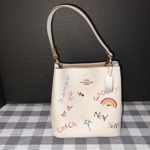 Coach small town bucket bag with diary embroidery